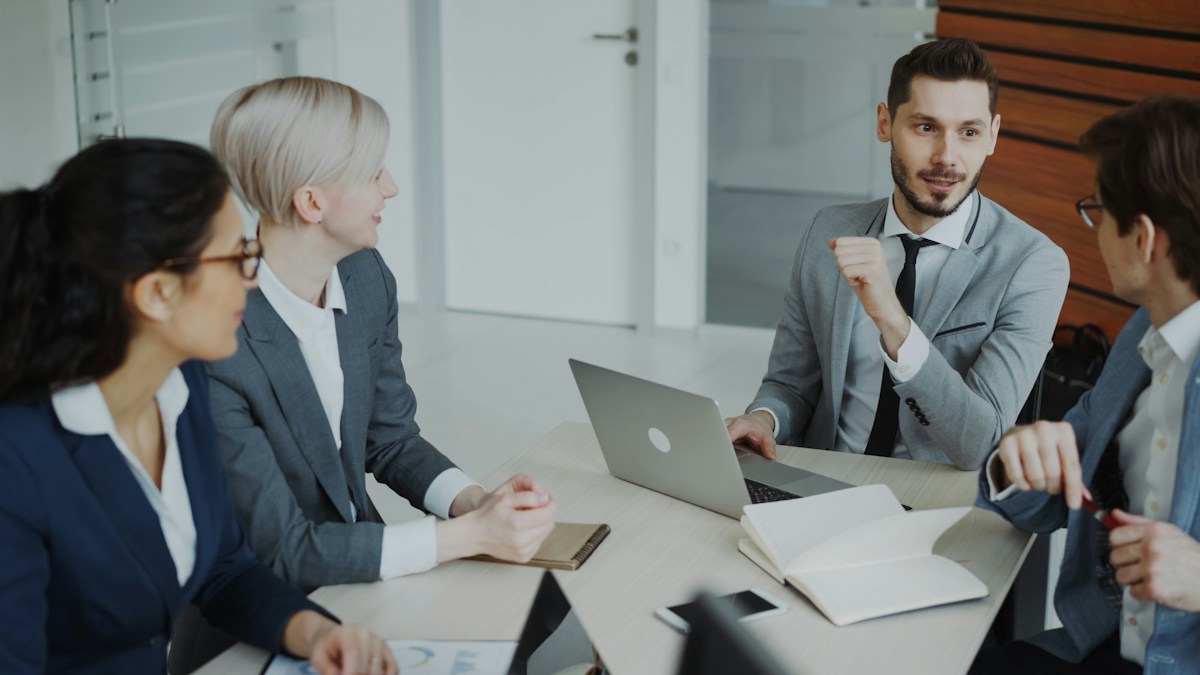 Professionals reviewing financial charts
